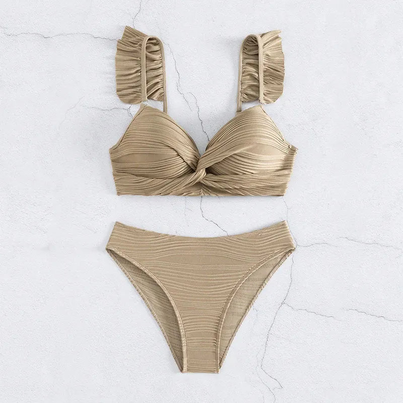 Women's solid colour bikini swimsuit in black laid flat, showing top and bottom pieces.