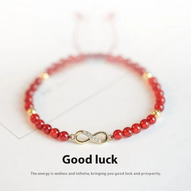 Hand-woven red agate bracelet with diamond-shaped beads and ethnic woven patterns