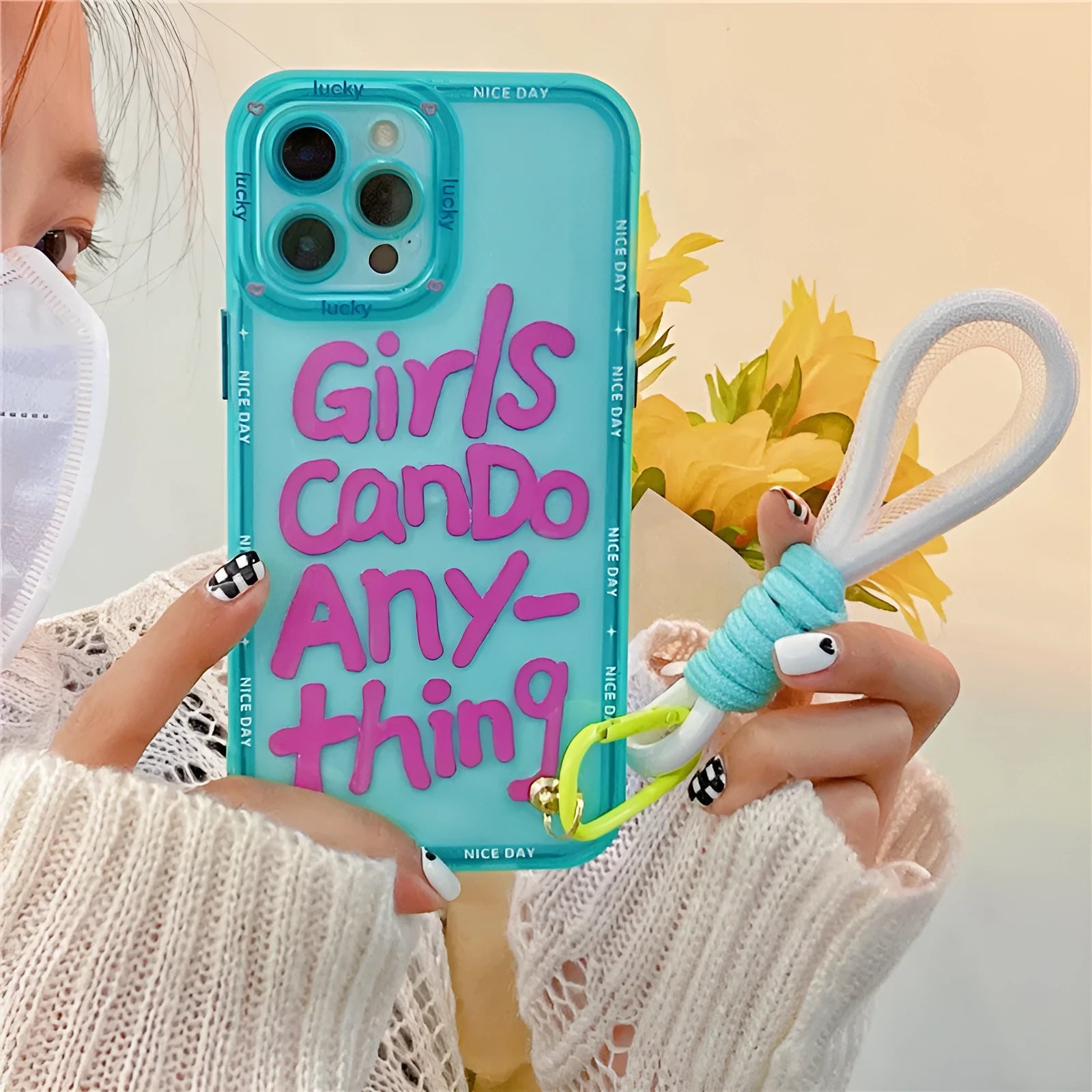 Mint green personalised graffiti lanyard phone case for Apple iPhone with printed design and attached strap.
