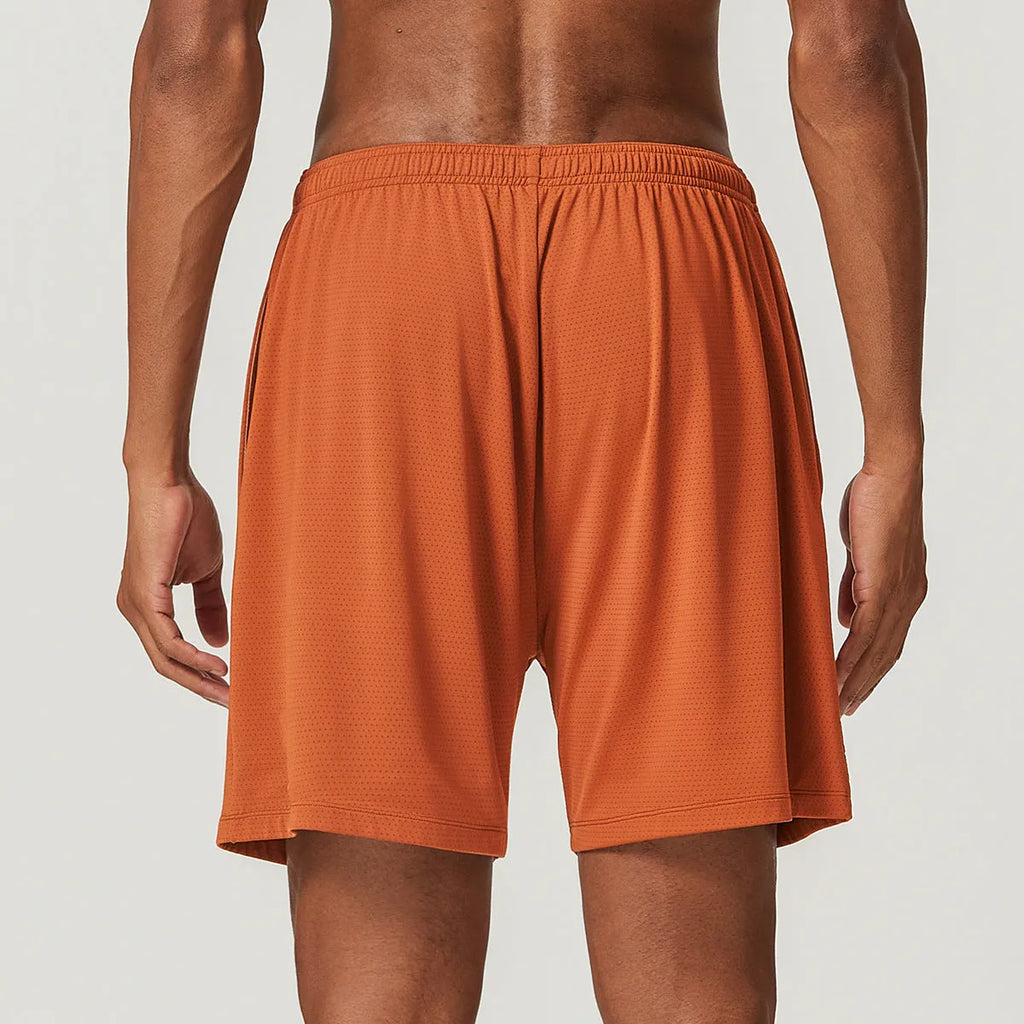 Men's quick-dry running shorts in brick red colour showing double-layer construction