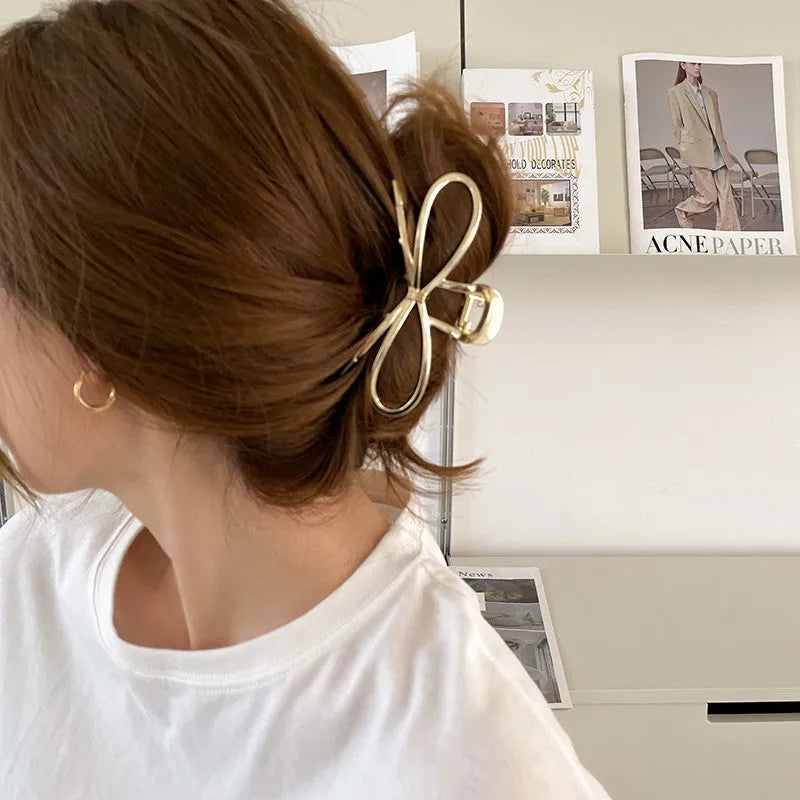 Korean style alloy bow barrette hair clip in gold or silver colour for women