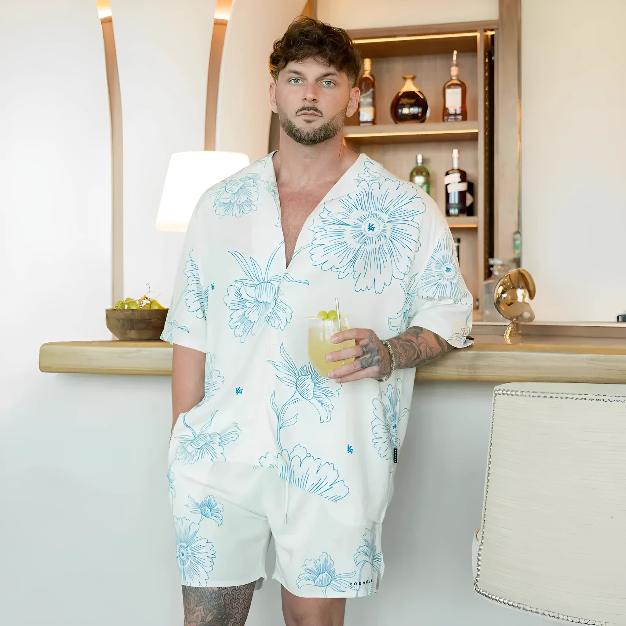 Men's loose fit printed short sleeve top in cardigan style with floral pattern