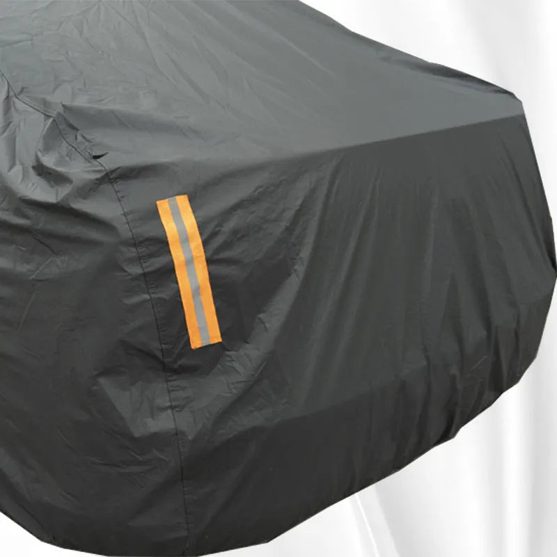 Grey PVC car cover for a Volkswagen vehicle showing rainproof and sun protection features.