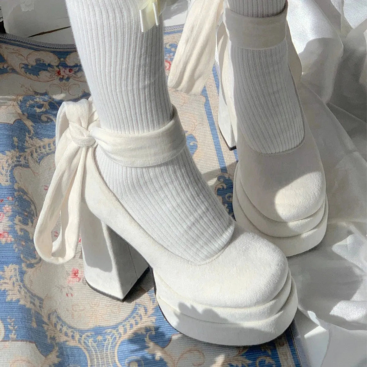 Women's suede Mary Jane high heels with cross lace-up front and buckle strap, shown in white, black, or pink, sizes 35-40