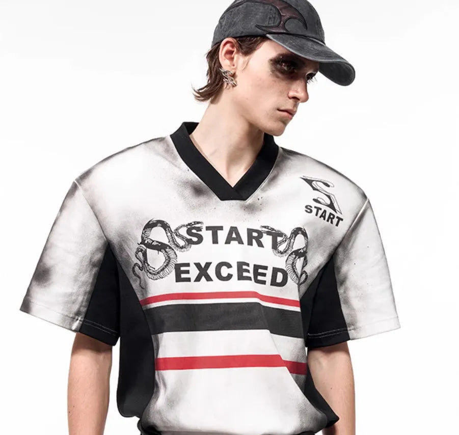 V-neck short sleeve polyester top with padded shoulders and letter snake pattern print in refined Korean style