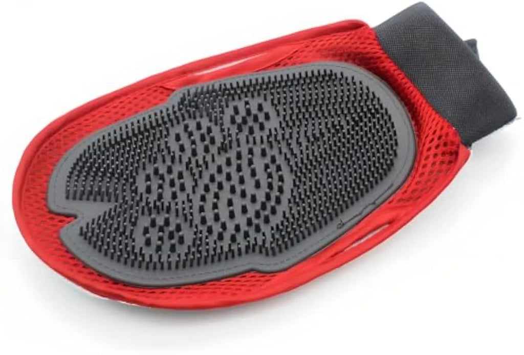 Red pet bathing glove with integrated brush for dog and cat grooming during washing.