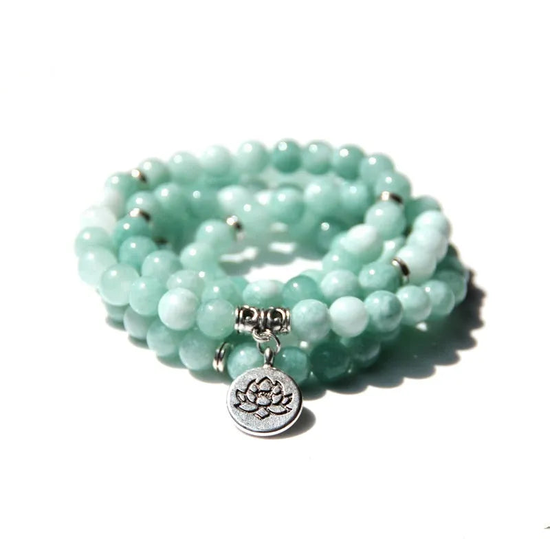 A vintage-style women's bracelet made from natural stone with a geometric lotus design.
