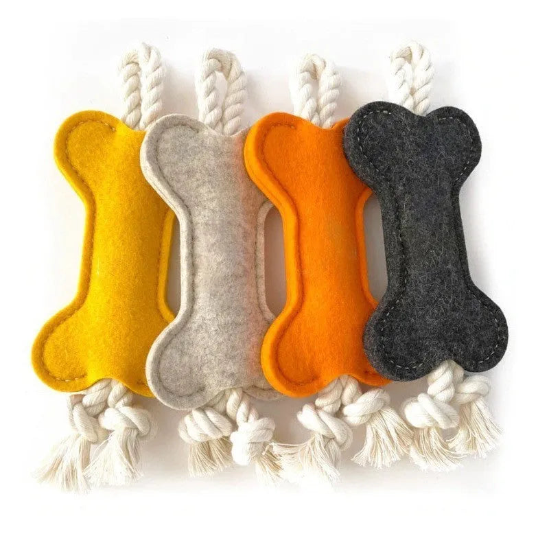 Bone-shaped dog toy with rope knots in four colour options showing dimensions of 16cm length