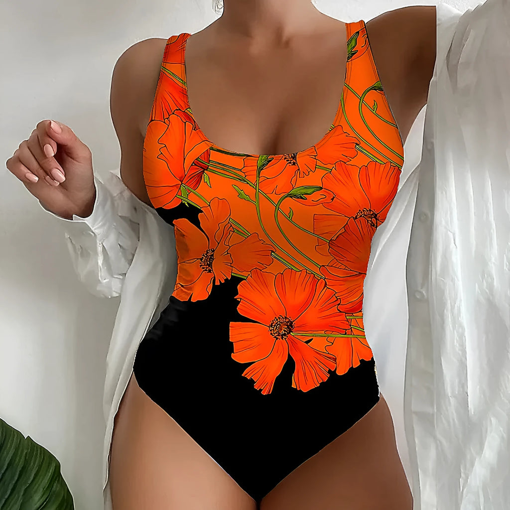 Orange flower print backless one-piece swimsuit on a model, showing slim fit design.