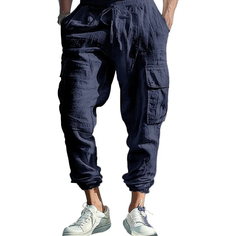 Men's linen casual trousers with ankle-tied cuffs and multiple pockets in solid colours