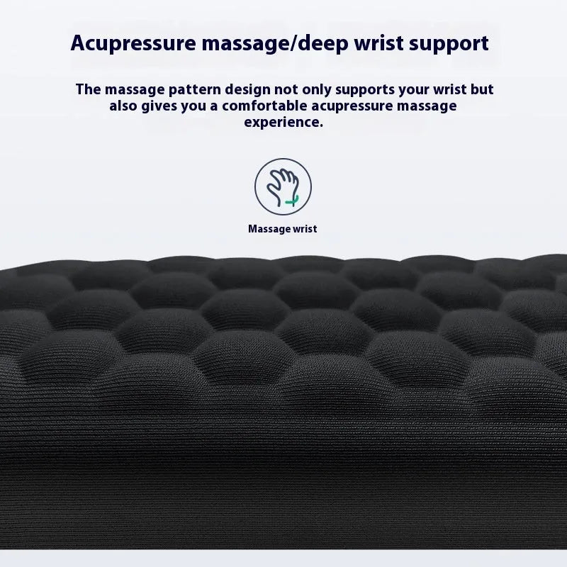 Memory foam mouse wrist pad with silicone bottom in black cloth cover on computer desk
