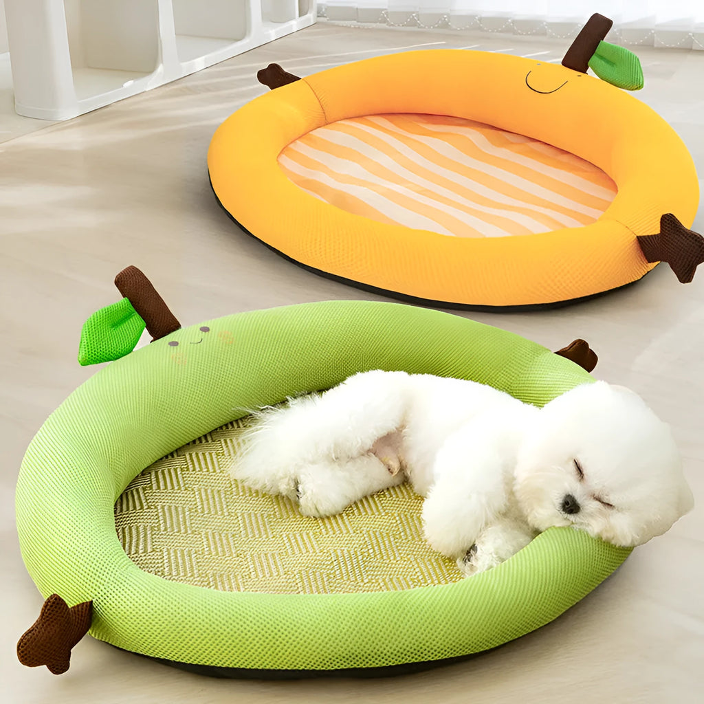 Green pet cooling mat with raised fruit backrest for dogs or cats on a wooden floor