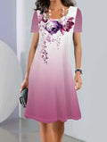 Lightweight ice silk A-line dress with a painted floral pattern, round neck, and short sleeves on a mannequin.