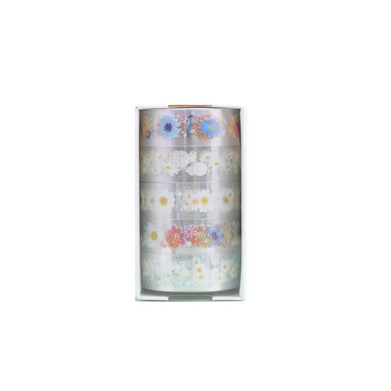Five rolls of transparent adhesive tape with a yellow and white midsummer daisy cartoon pattern, each 1.5cm wide.