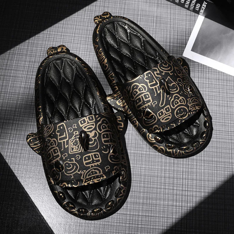 Pair of grey shark design open toe EVA home slippers on a white background.