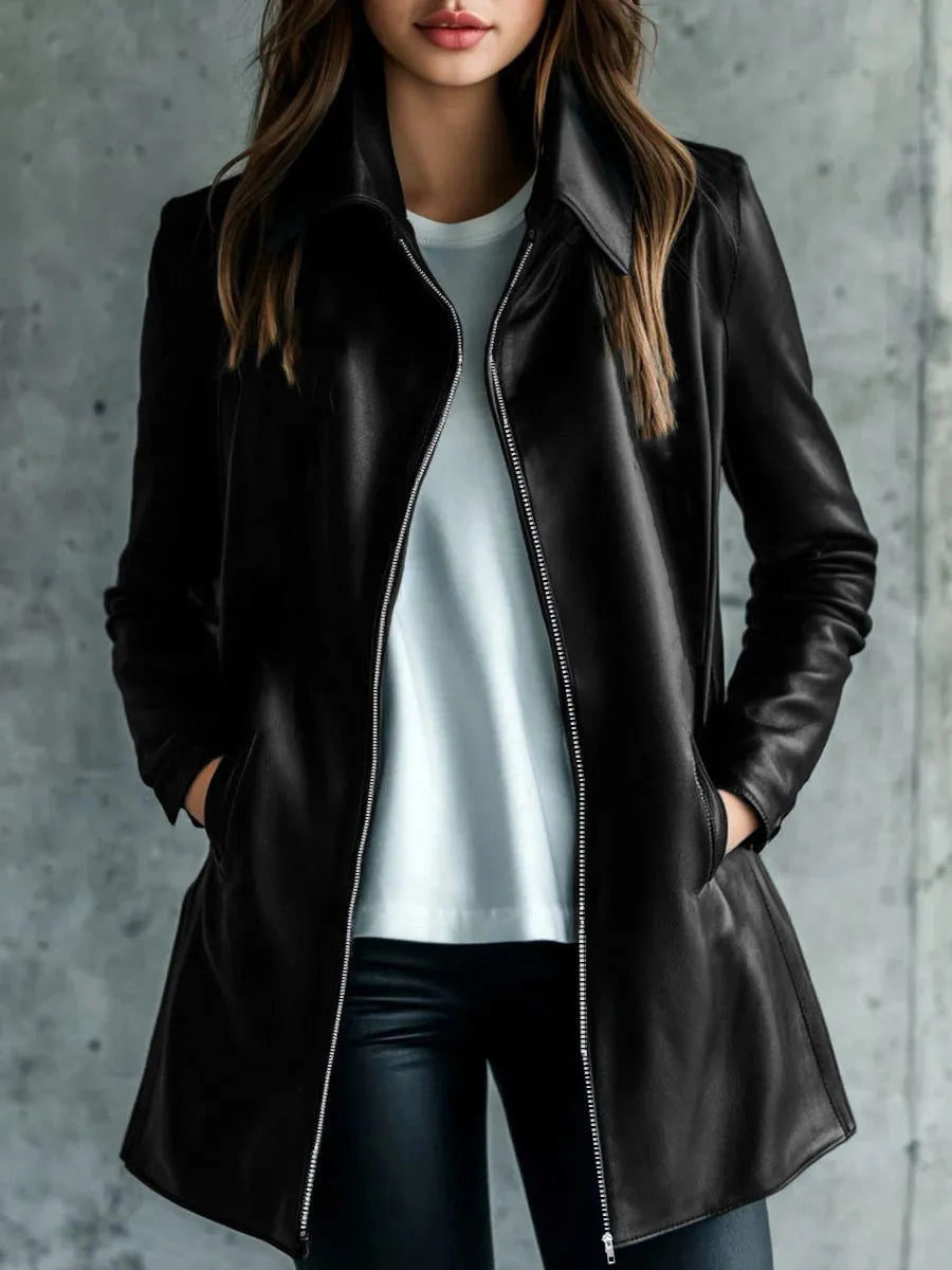 Black women's medium length leather jacket on a hanger