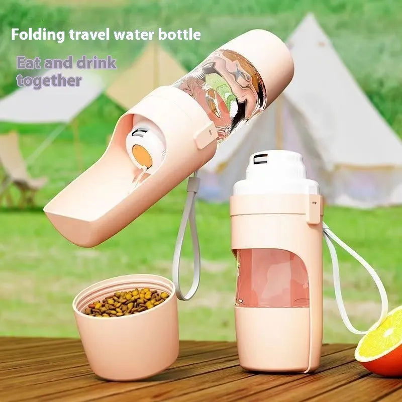 Grey portable 2-in-1 dog travel water bottle and feeder with detachable lanyard.