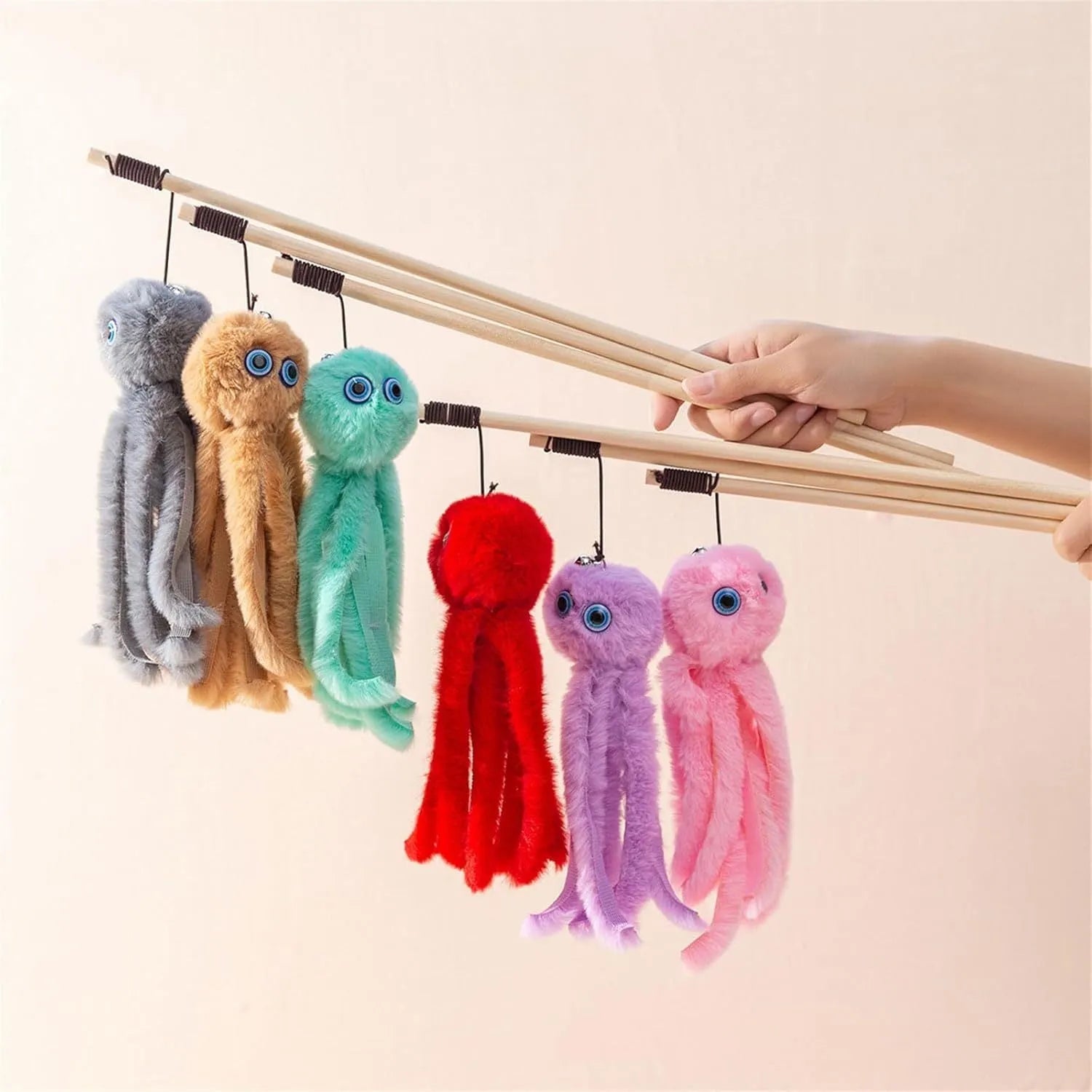 Octopus design cat toy with long stick in bright colours for indoor kitten play