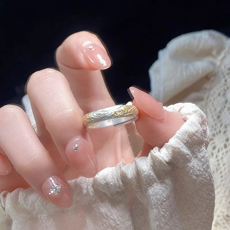 Traditional Xiangyun pattern white copper ring with electroplated silver gold finish and open mouth geometric design