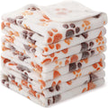 Coral fleece dog blanket showing dog's paw pattern in available colours with size options from XXS to XXL