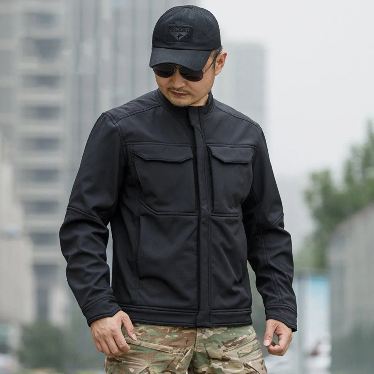 CP camouflage soft shell tactical jacket for mountaineering and camping on a mannequin