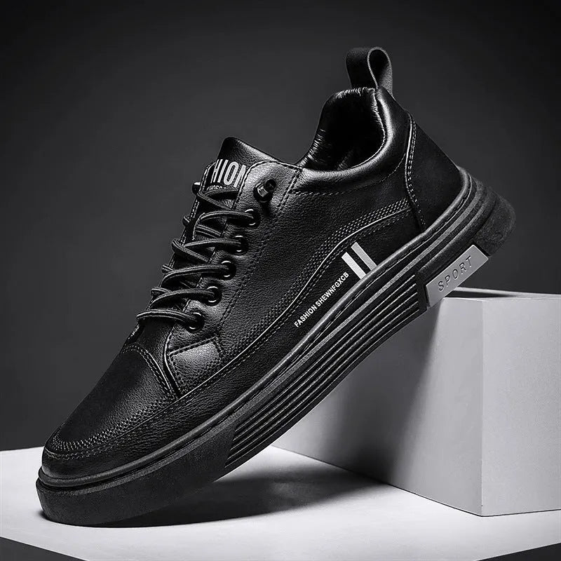 Men's white and black skateboard shoes with elastic band closure and rubber sole