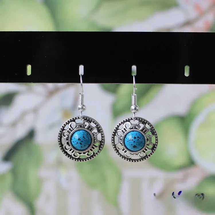 Miao silver retro turquoise flower disk earrings with geometric ethnic patterns