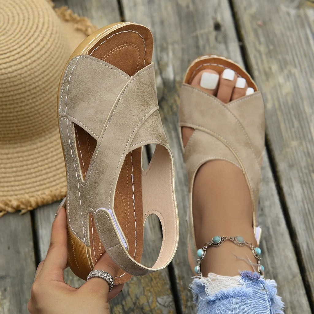Roman platform sandals with ankle skirt and Velcro closure in open-toe design