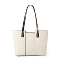 Women's black genuine leather commuter bag with crossbody strap and internal organiser pockets