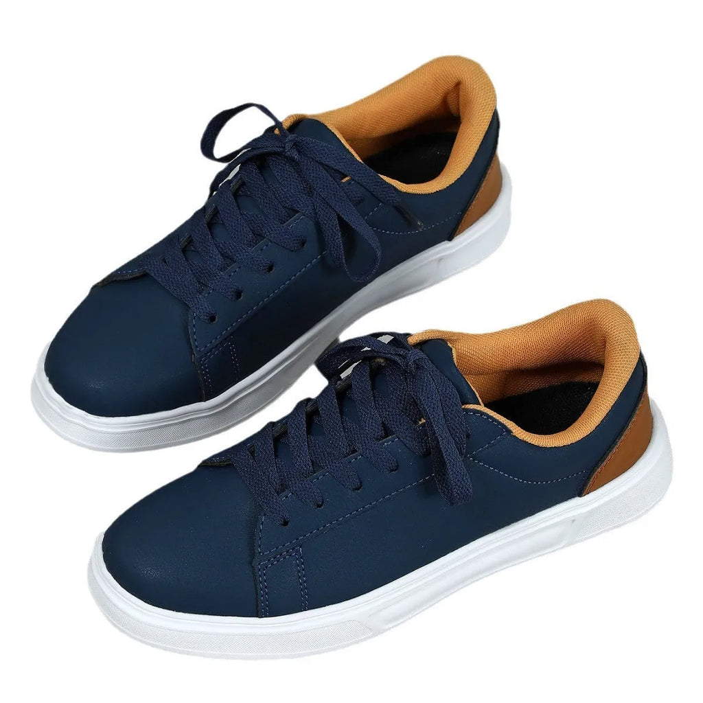 Casual platform sneaker with cross strap detail on artificial PU upper in beige brown colour