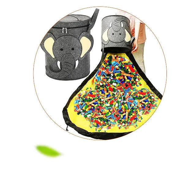 Green felt cube storage bag with pull rope, laid flat as a play mat