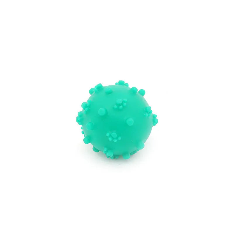 Four bright coloured spiky dog balls with paw print dimples, 2-inch diameter for small breed puppies