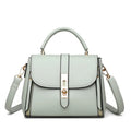 Women's soft leather messenger bag in square vertical design with adjustable shoulder strap