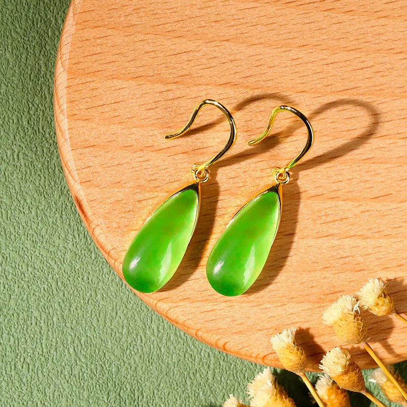 Retro geometric Chinese style earrings with water droplet design in electroplated jade colour.
