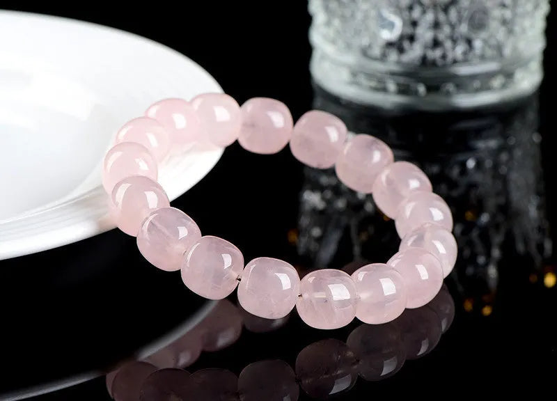 Pink bamboo crystal bracelet with 11mm barrel beads in original geometry design