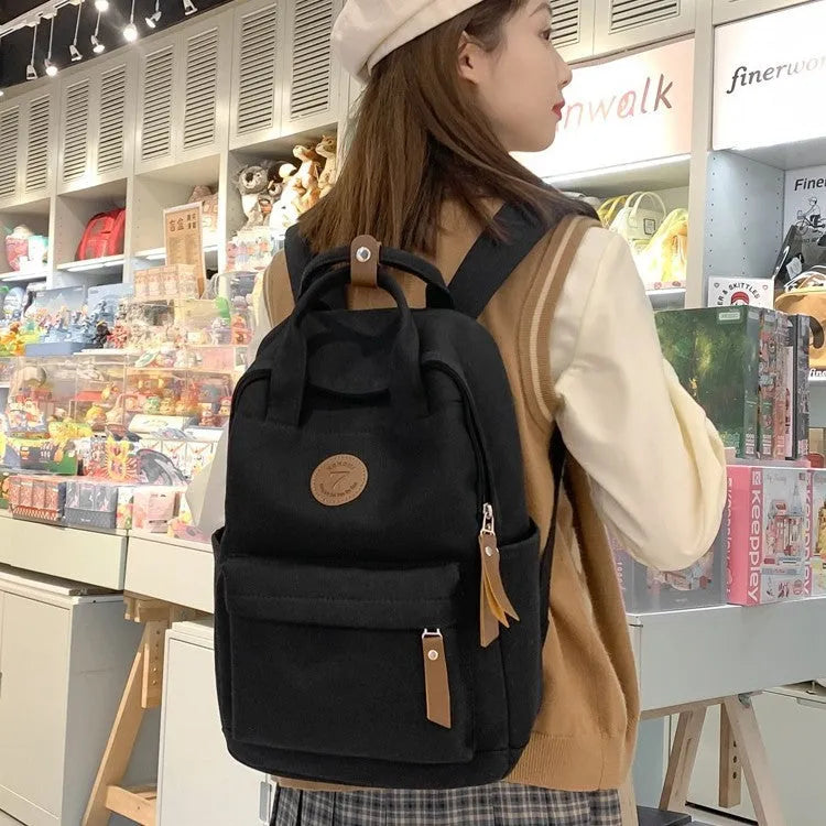 Black Oxford cloth retro backpack with curved shoulder straps