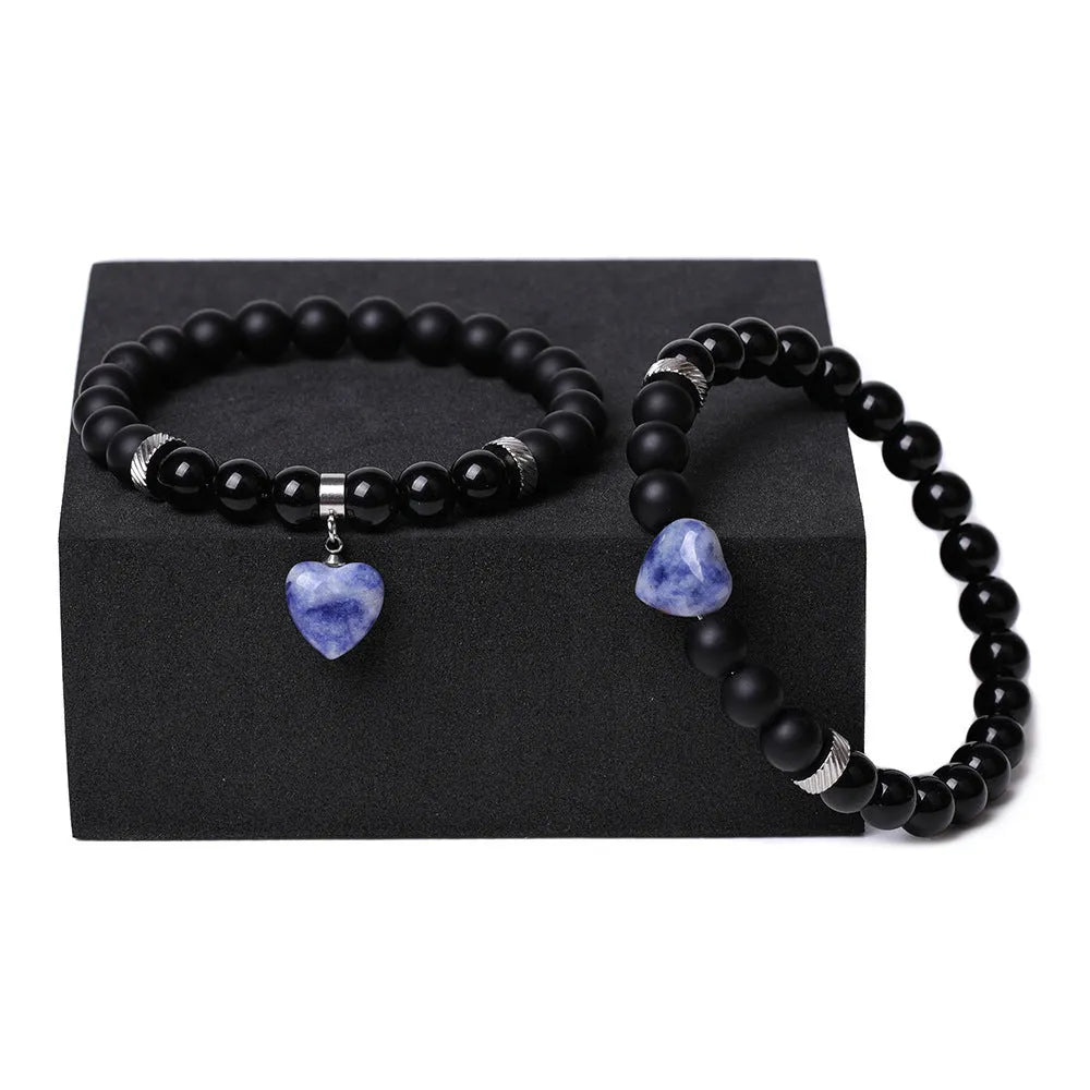 Polished natural stone couple heart bracelets in obsidian, agate, tigereye, crystal, aventurine, topaz, opal colours.