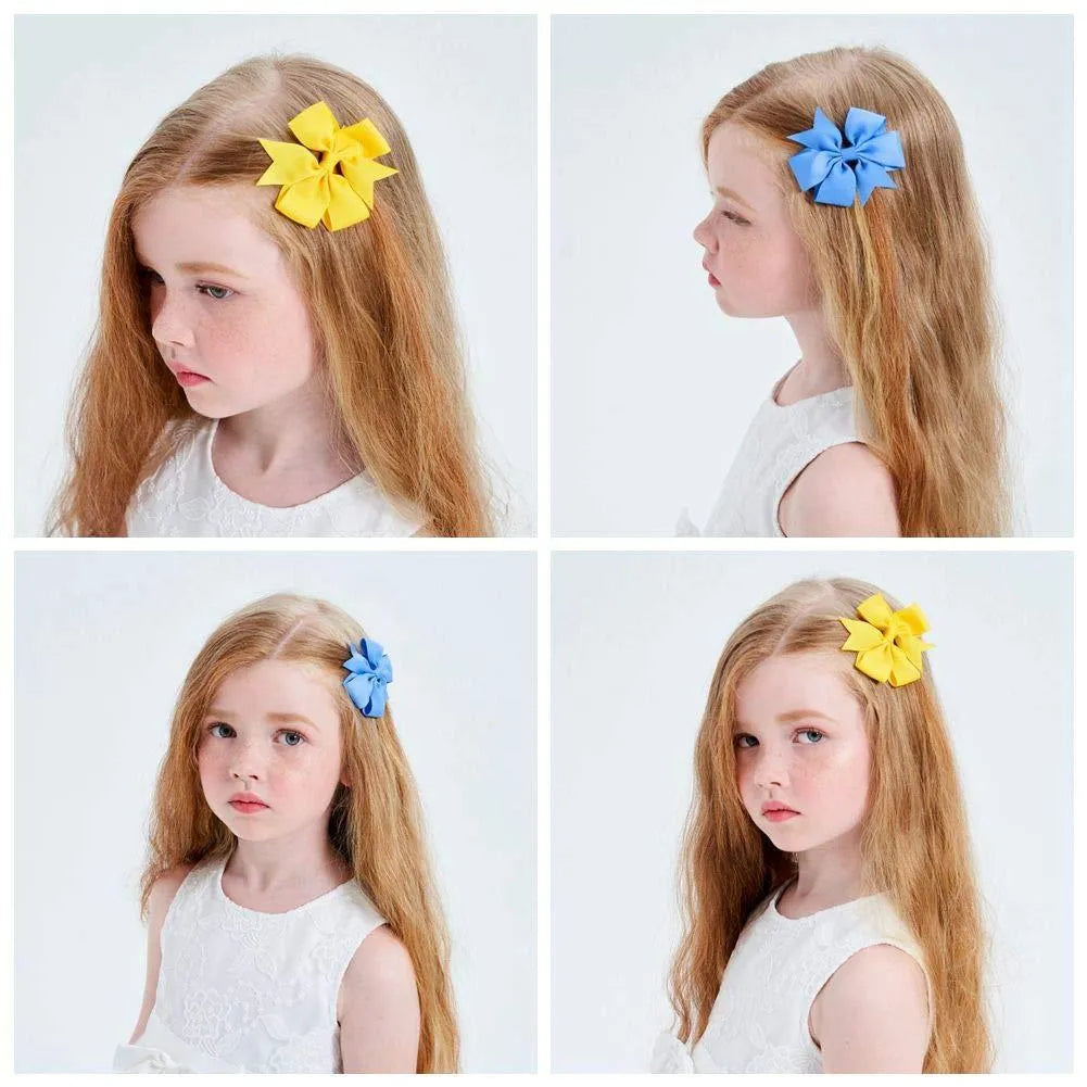 Assortment of 20 colourful 3-inch grosgrain ribbon hair bows with alligator clips for baby girls and toddlers.