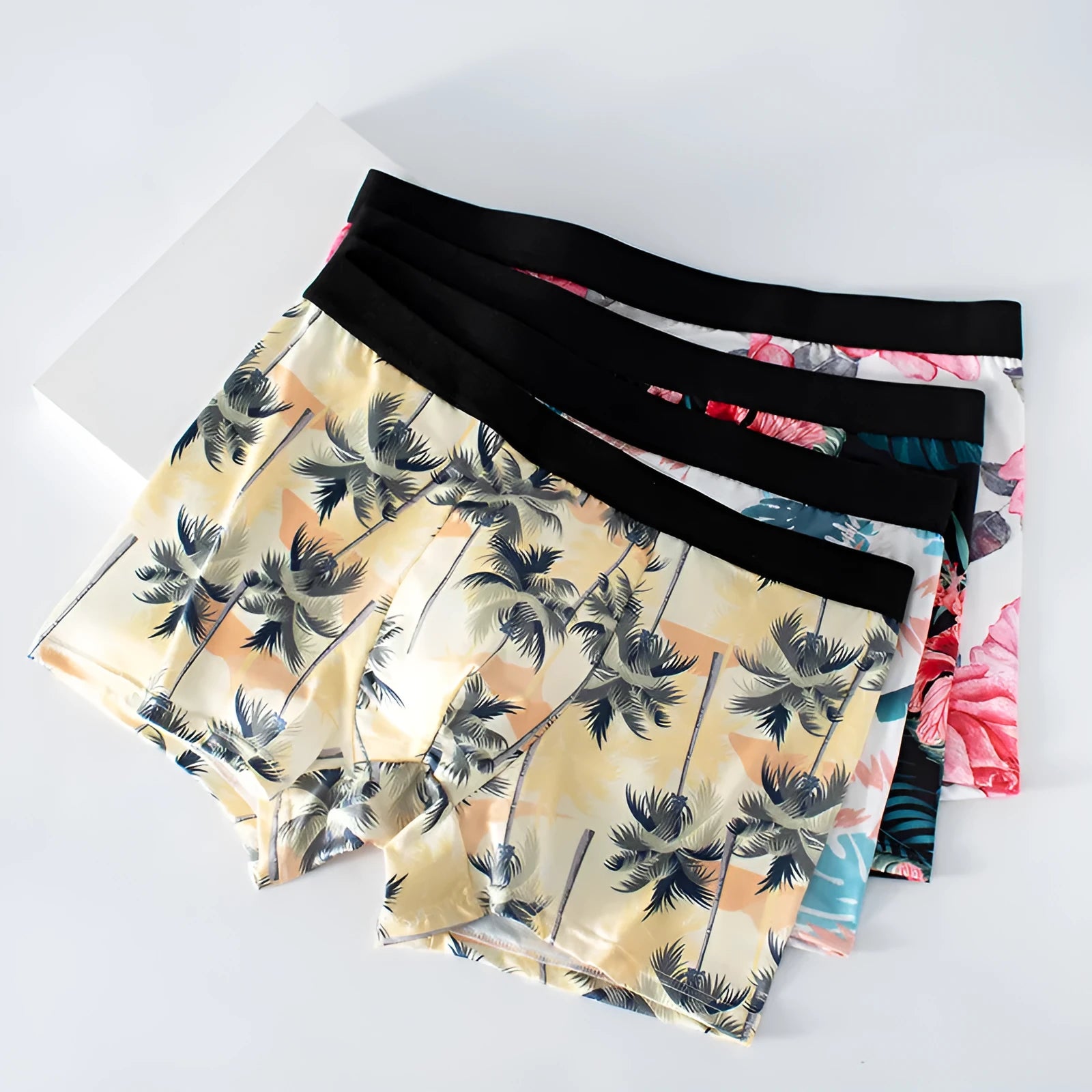 Men's ice silk underwear with fashion printing showing mid waist design and breathable polyester fabric