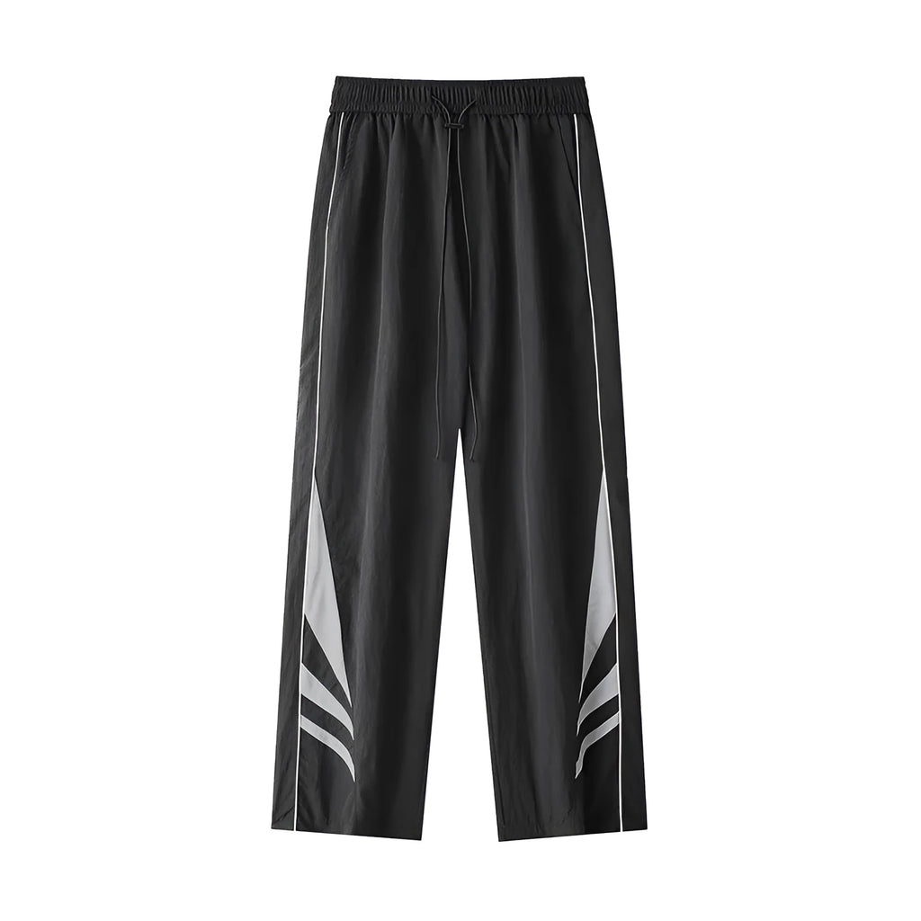 Men's straight-leg loose fit summer sports trousers in grey, showing button fly and elastic waistband.