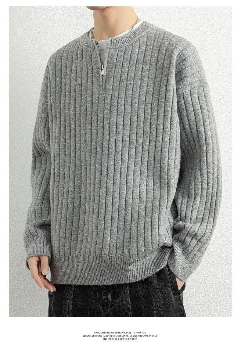 Men's grey half zip loose sweater with textured knit pattern and long sleeves
