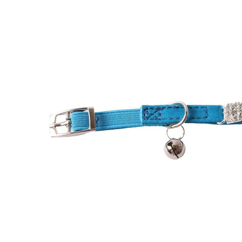 Soft flocking cat collar with an elastic buckle shown in one of six available colours.