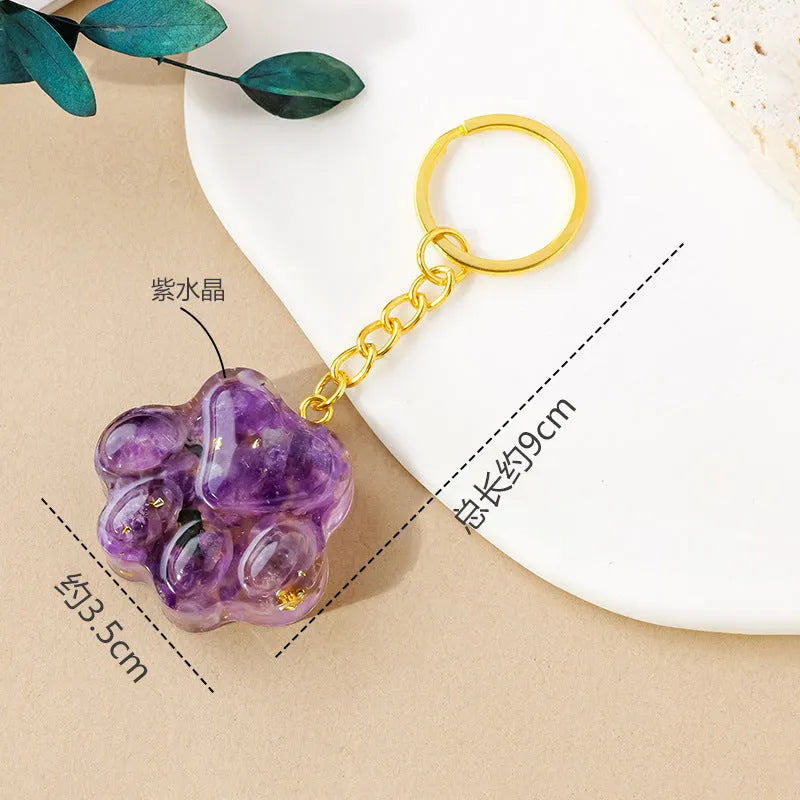 Natural crystal cat's paw keychain pendant on a metal ring in one of ten random stone colours.