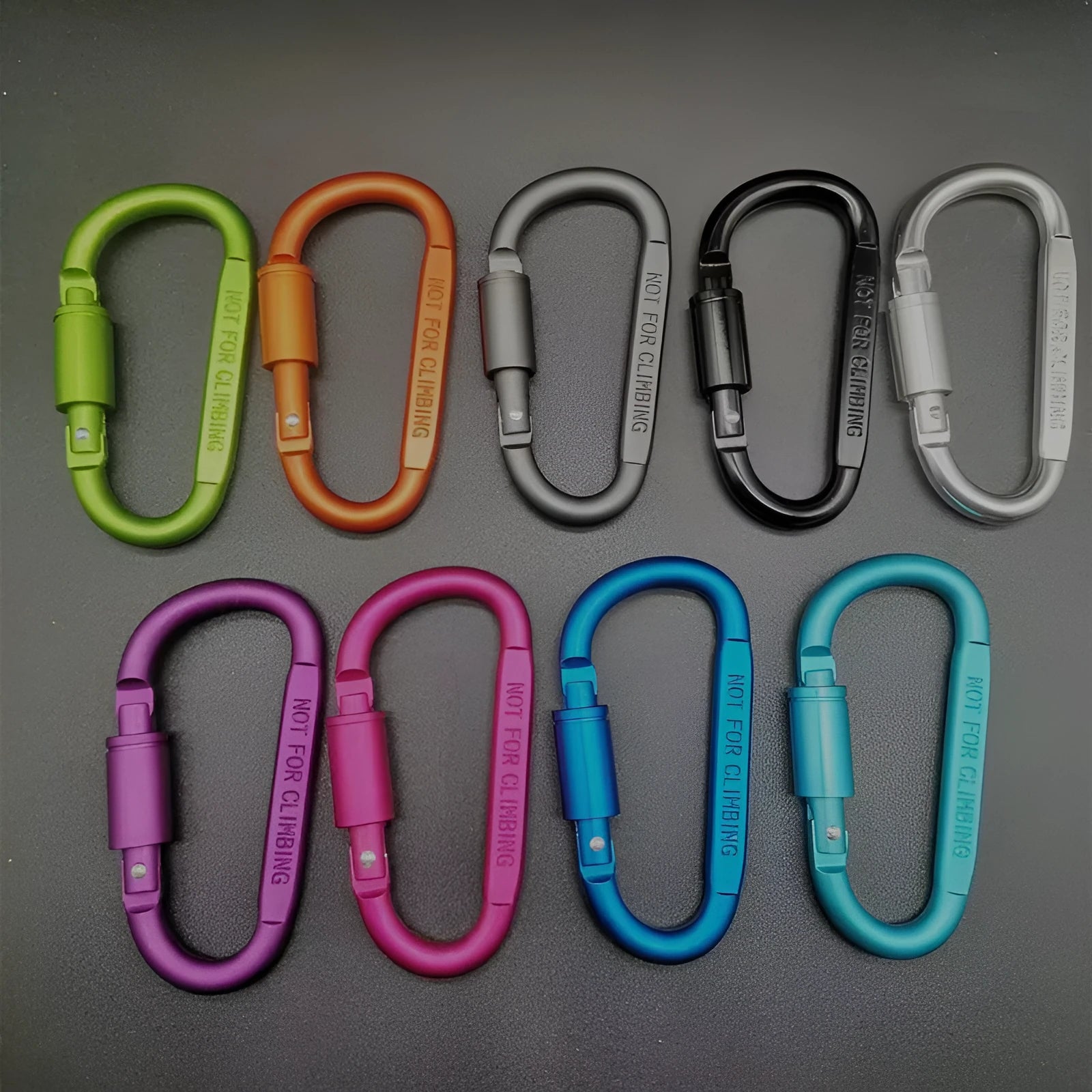 D-type aluminium climbing carabiner with screwgate lock in bright silver colour showing 8cm flat profile