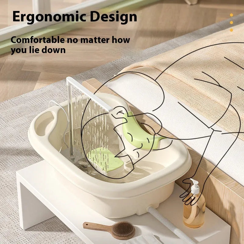 Portable plastic shampoo basin with head pad, circulating pump and massage brush for bed use.