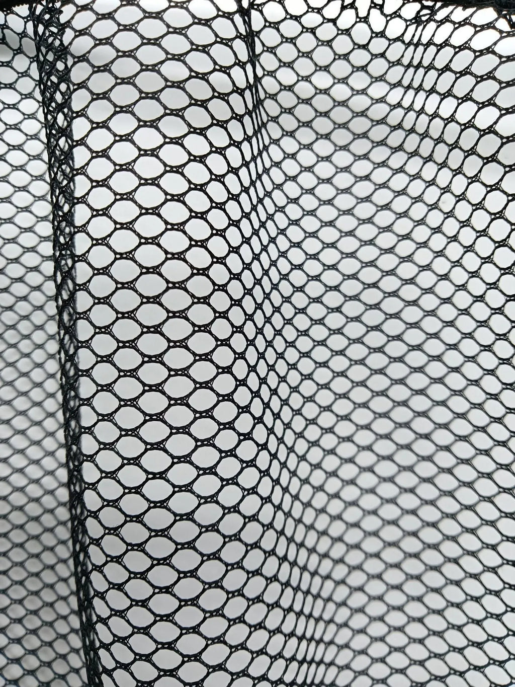 Elastic polyester storage net for securing items in a car boot, shown in 20x35cm and 20x45cm sizes.