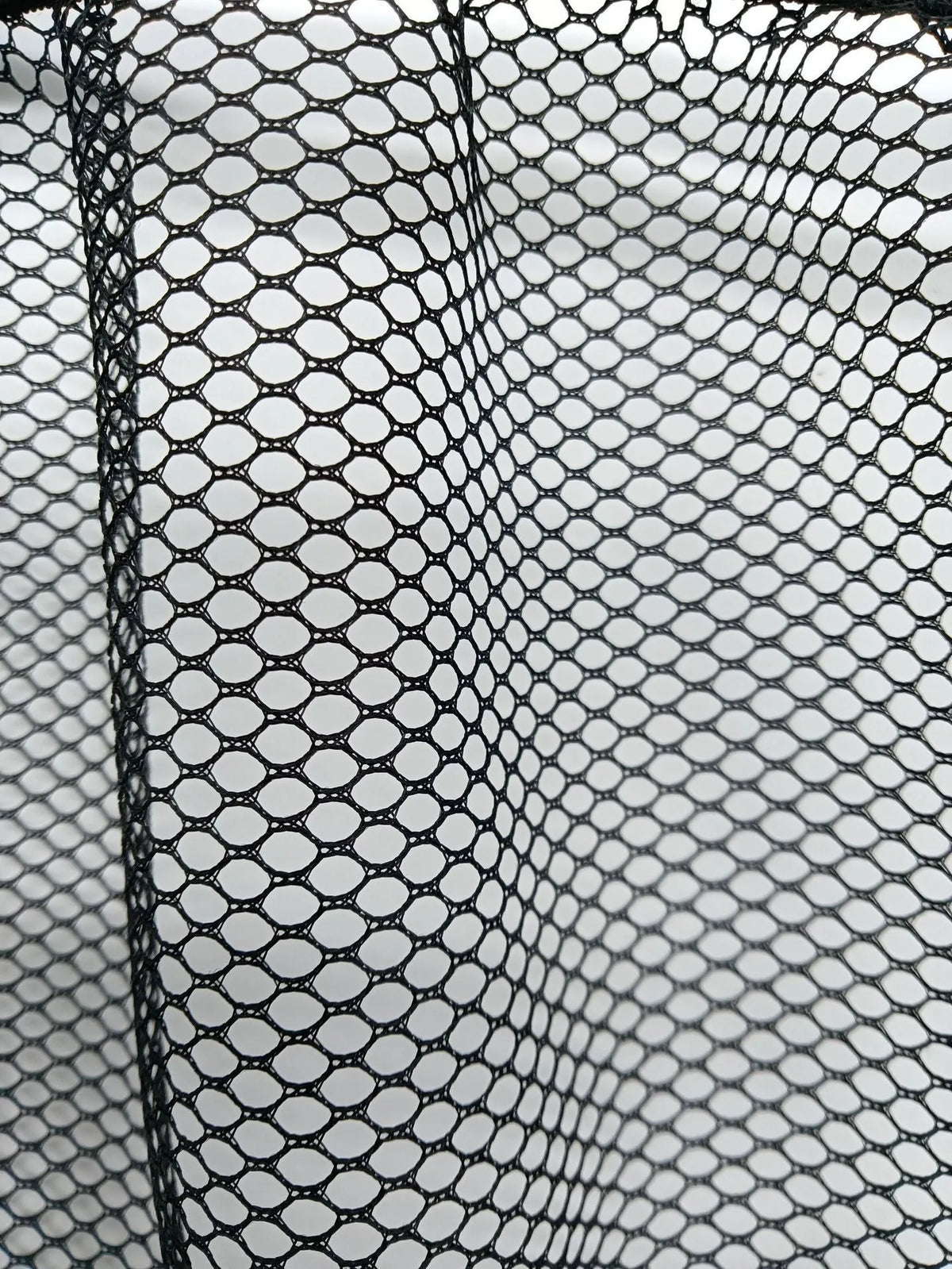 Elastic polyester storage net for securing items in a car boot, shown in 20x35cm and 20x45cm sizes.