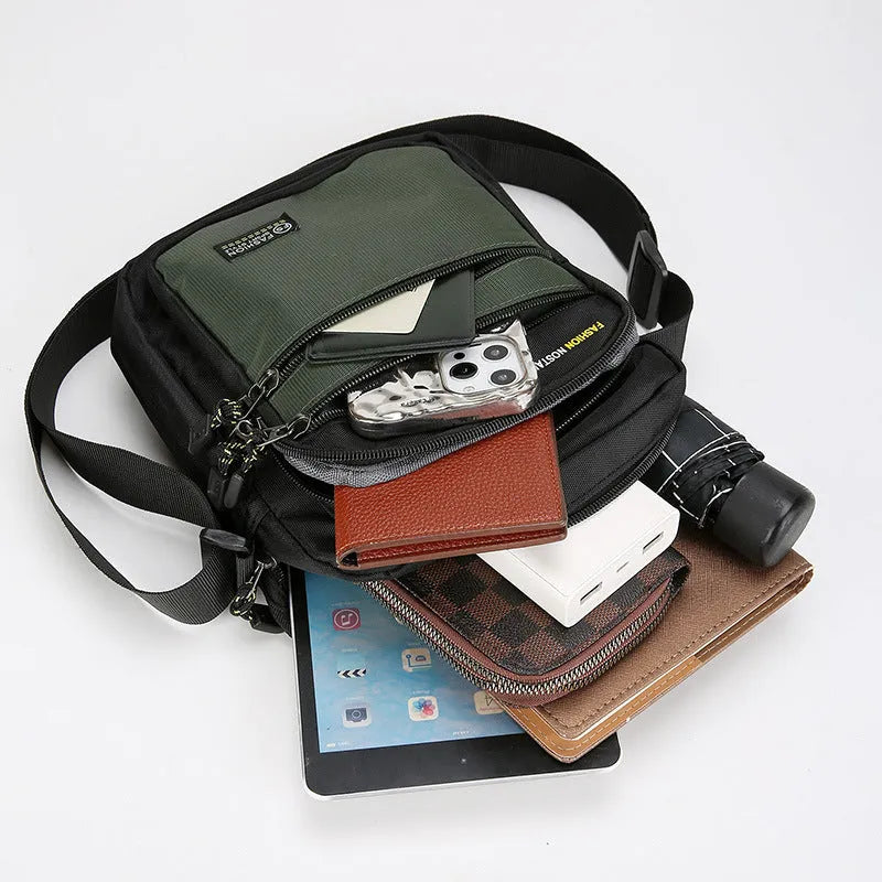 Men's nylon crossbody bag in green, shown with multiple pockets and adjustable shoulder strap.
