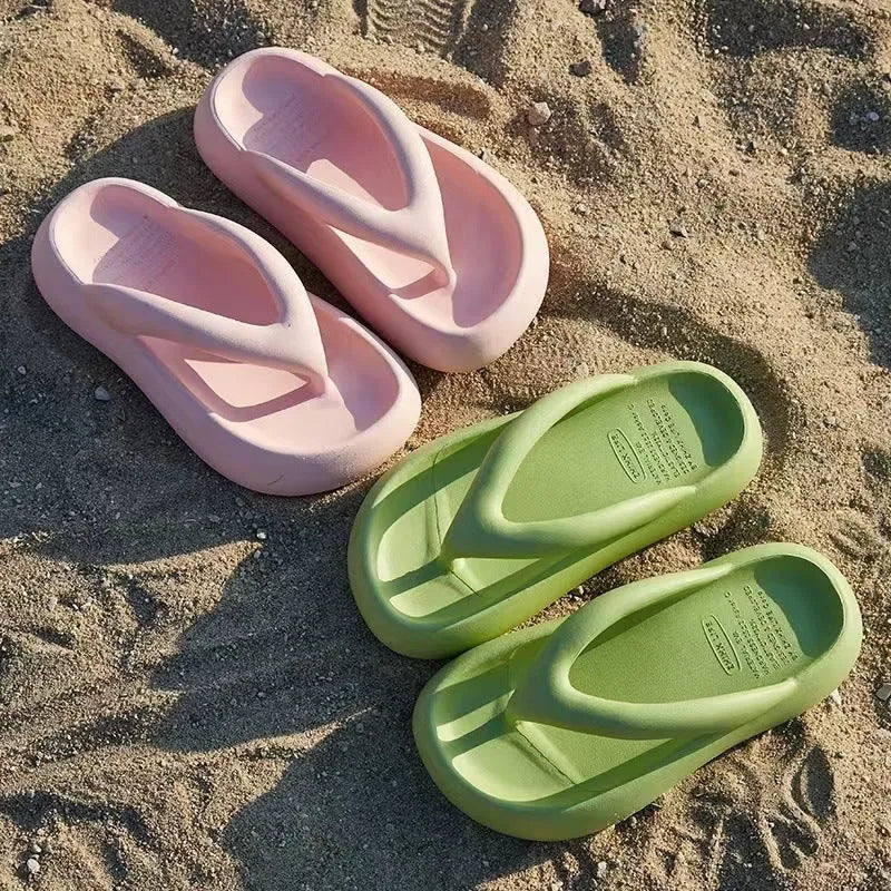 Solid colour thick-soled EVA flip-flops with a bow detail on the strap.