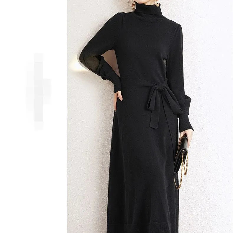 Turtleneck knitwear dress with elastic waist and loose big hem in polyester fabric